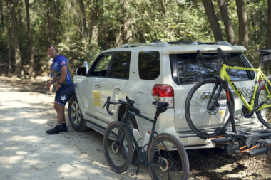 gravel century ride SAG wagon with cyclist